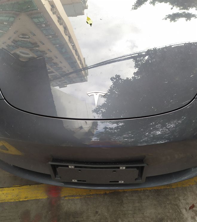 Что это за автомобиль с эмблемой похожей на Т?